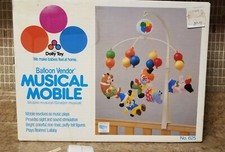 Vintage Dolly Toy Balloon Vendor Revolving Musical Mobile 625 Crib or Wall Mount