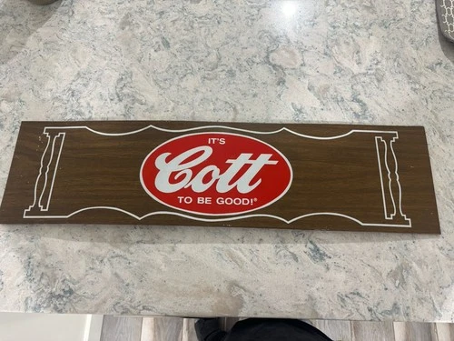Vintage It’s Cott To Be Good Tin Tacker Soda Sign