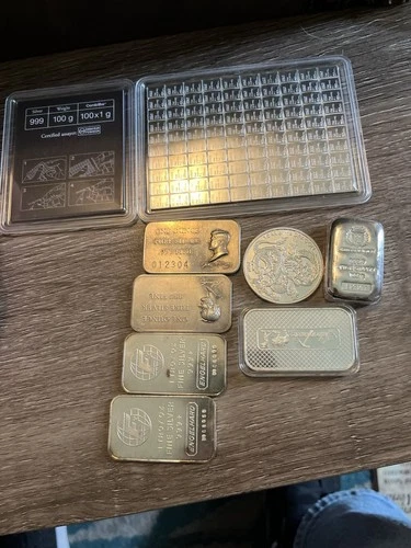 Collection of 10 Troy ounce Bars .999 fine silver From  Reputable Mint's Auction