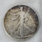 1935 S Walking Liberty Half Dollar with rainbow Toning in VG Condition
