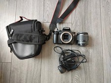 Canon 1100D SLR Digital Camera Body With 18-55mm Lens Attachment  Accessories