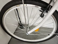 Woman's 26" white beach bike with basket. 