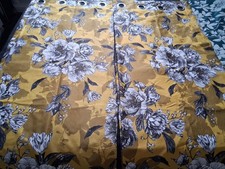 NEXT OCHRE AND BLACK EYELET LINED CURTAINS 46 X 72ins.