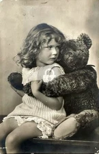 Stuffed Teddy Bear Hugging Young Girl 1912 RPPC Photo Postcard COPY