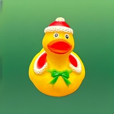 Christmas Rubber Duck In Red Hat And Cape And Green Bow