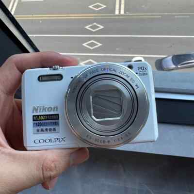 Nikon COOLPIX S7000 16.0MP 20x Optical Zoom Digital Camera English White