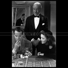 Photo F.012812 GENE TIERNEY & HENRY FONDA (RINGS ON HER FINGERS) 1942