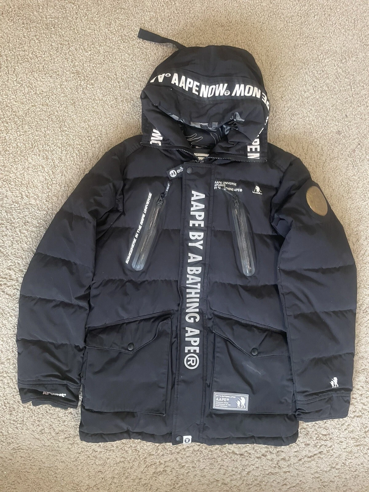 A BATHING APE (BAPE) RARO PIUMINO CON CAPPUCCIO ADULTO AAPE BY A BATHING APE LARGE MRSP $749