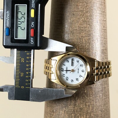 Seiko Women V138-0AA0 Dress Gold Tone Solar 25mm Watch 6 1/4  display picture 1