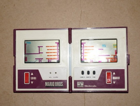 NINTENDO GAME AND WATCH MW-56 MULTI-SCREEN MARIO BROS. MADE IN JAPAN 1983.