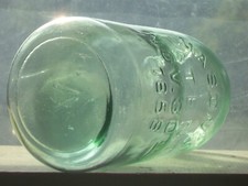 Green 1 qt. Mason's Patent Oct. 30th 1858 ground lip canning Jar. V. Marked Base