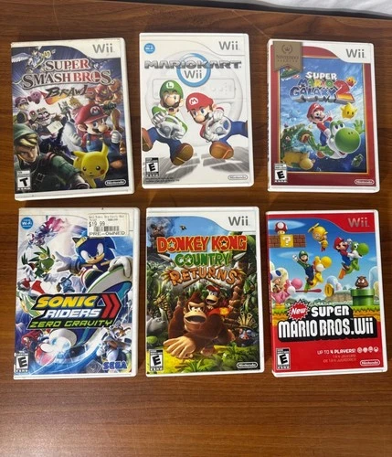 Lot 6 Wii Game Collection: Super Smash Bros. Brawl Mario Kart Wii Super Mario Ga