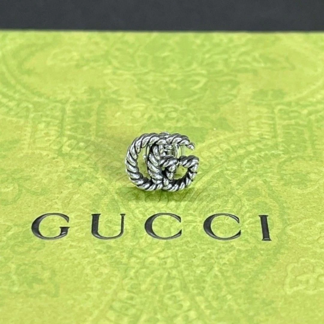 Boucles d'oreilles GUCCI une oreille GG Marmont double G torsadée argent 925 accessoires pour femmes