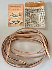 Basket Making books and wood handles and hoops for weaving structure.