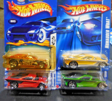 4) 1957 Custom Chevy Nomads. HW "Nomadder What"