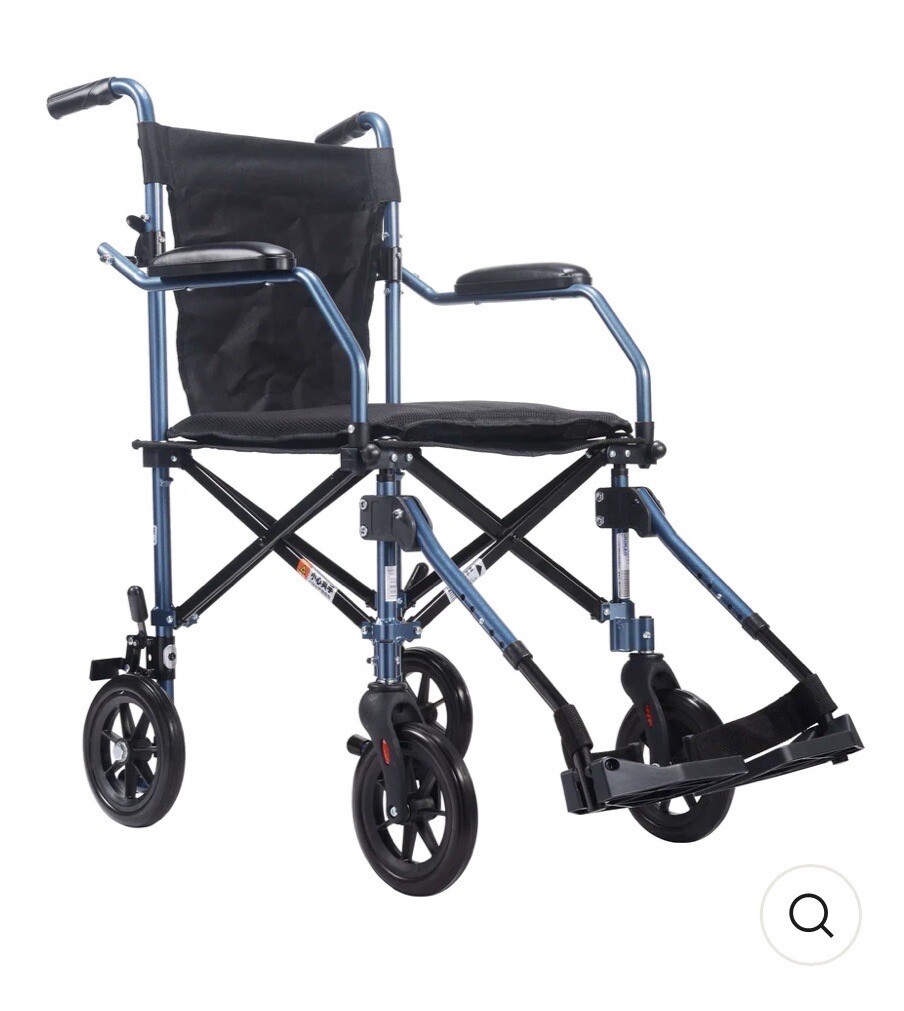 New HECARE Ultra Lightweight Folding traveLite transit wheelchair in a
