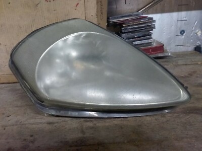 MITSUBISHI ECLIPSE HEADLIGHT ASSEMBLY PASSENGER SIDE HAS SOME HAZE 2003-2005