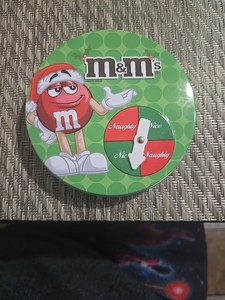 M&M's Chocolate Candy 2010 Naughty & Nice Spinner Christmas Tin 