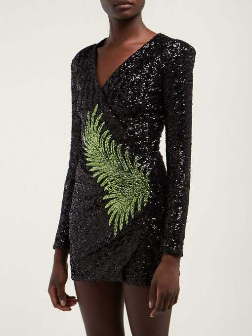 balmain x h&m green sequin dress Who Wore It Better? Cecilia Suarez vs. Kat Graham in Balmain x H&M's Green Plunging Sequin Mini Dress