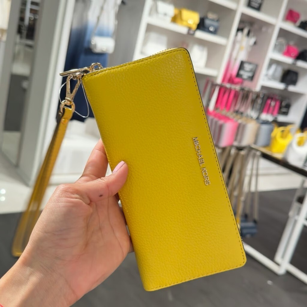 【即発】マイケルコース JET SET TRAVEL MD WLLET DAISY YELLOW Michael Kors Jet Set Travel Leather Continental Wristlet
