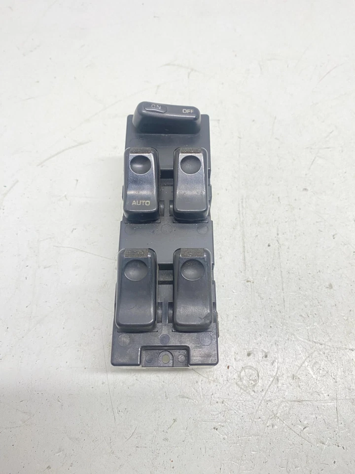 Interruptor de control de ventana del lado del conductor delantero izquierdo Mazda 929 1992 OEM Foto 2 de 4