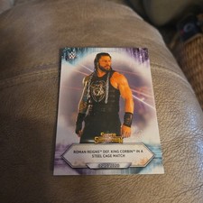 2021 Topps WWE #24 Roman Reigns def. King Corbin in a Steel Cage Match card