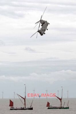 PHOTO  CHINOOK HC4 AN RAF CHINOOK HC4 DEMONSTRATING ITS ABILITY TO HANG IN THE A