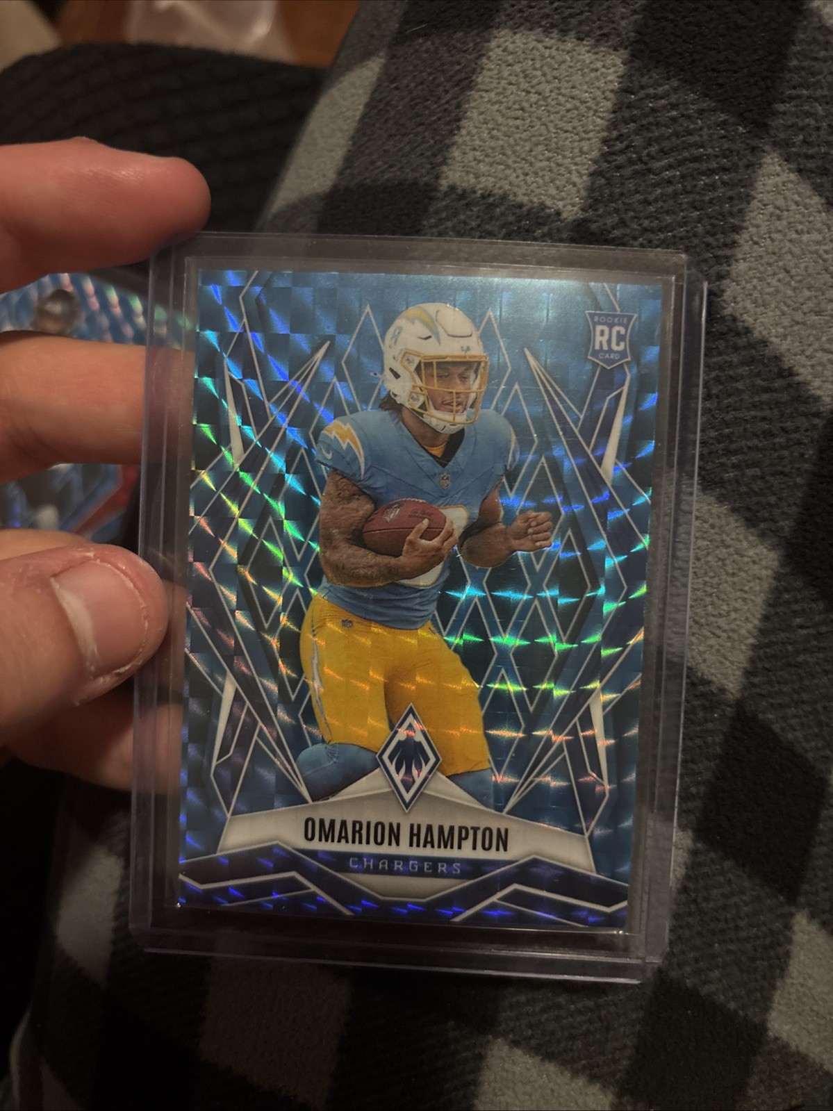 2025 Panini Phoenix - Rookies Omarion Hampton #192 Light Blue Pyramids /385 (RC)