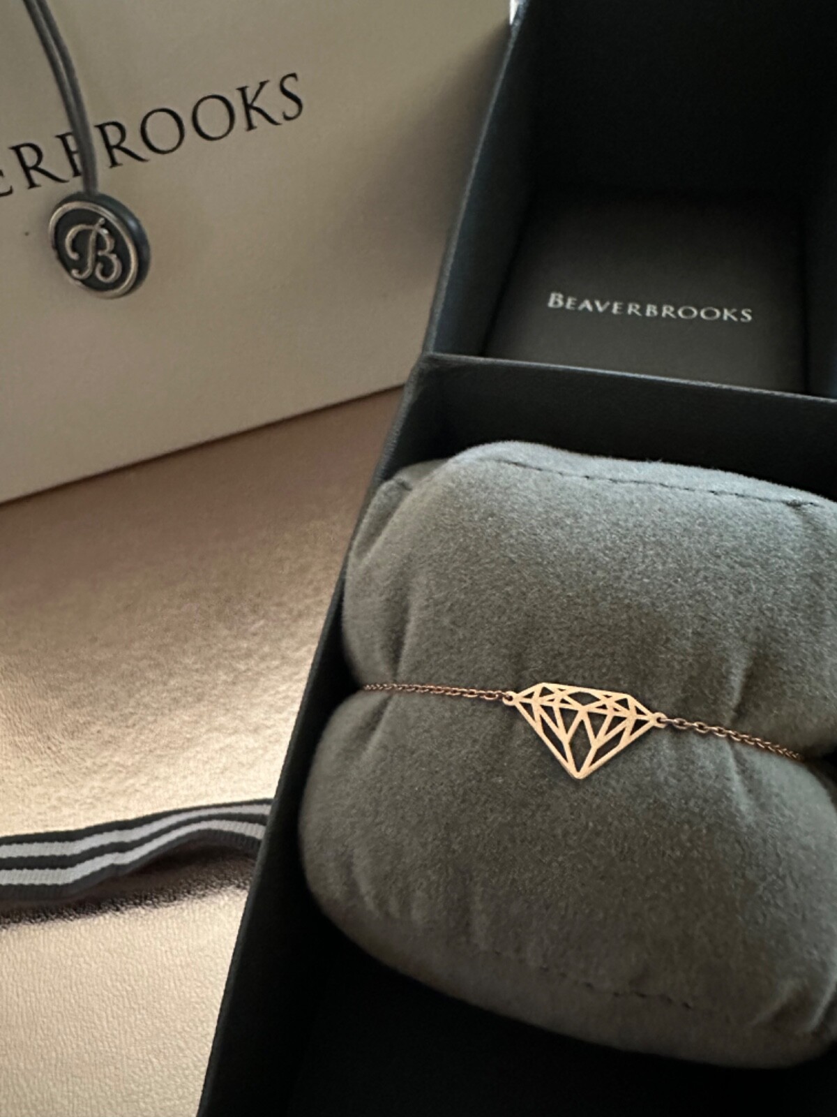 Beaverbrooks 9ct rose gold bracelet with diamond detail, brand new