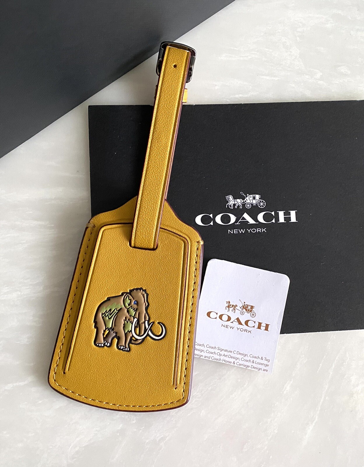 NWT COACH WOOLY MAMMOTH FLAX GLOVETANNED LEATHER LUGGAGE TAG 55467 