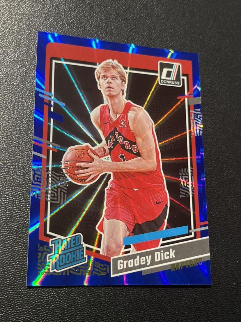 Gradey Dick 2023-24 Donruss Rated Rookie Holo Blue Laser /49 RC #247 Raptors