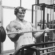 A Arnold Schwarzenegger Black And White Lifting weights 8x10 Photo Print
