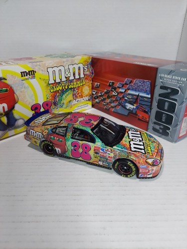 Elliott Sadler 2003 M&M's Groovy Summer Ford Taurus 1/24 Scale Nascar Diecast