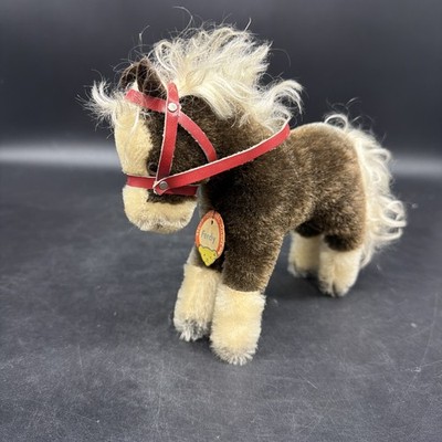 Rare Steiff Ferdy the Horse, brown fur, red harness, small two-tone eye. 
