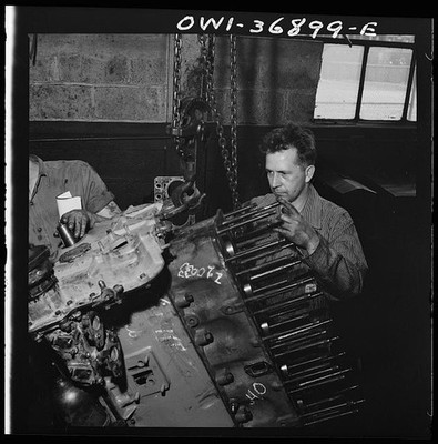 Photo:Aircraft Engine Repair Worker 1930s 1940s Mechanic on Radial Engine