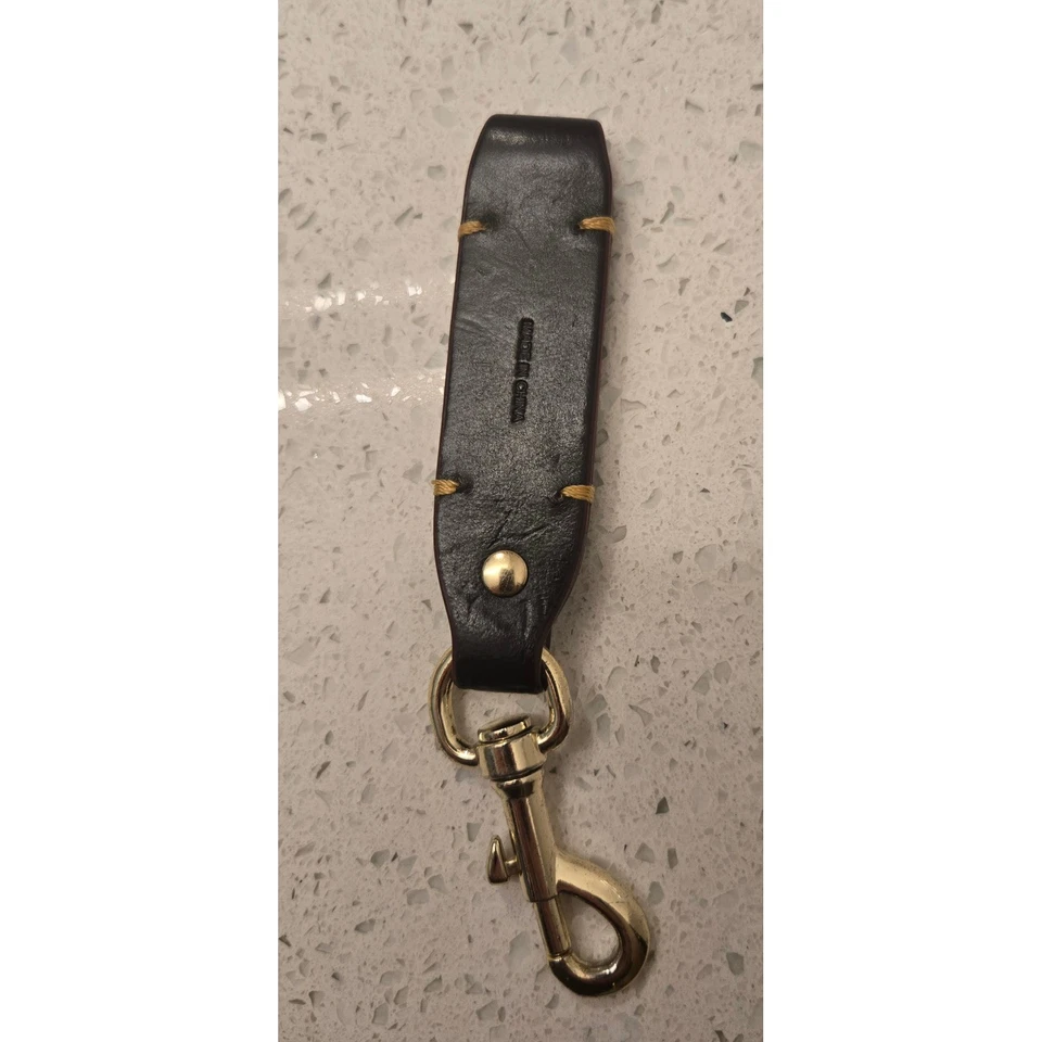 Llavero Dooney & Bourke de cuero negro logotipo de pato tono dorado clip llavero Foto 3 de 4