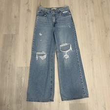 Levi  s Ribcage Wide Leg size 28 light wash jeans with busted knee detail