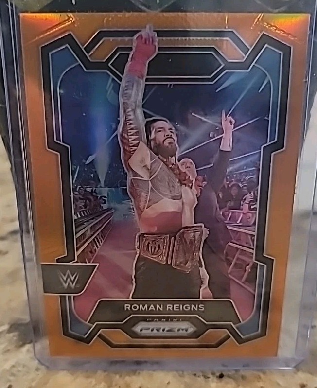 2024 Panini Prizm WWE - Roman Reigns #191 Orange Prizm /99