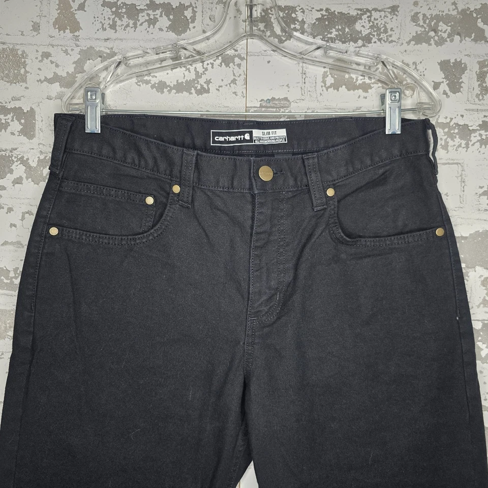 Pantalones de mezclilla Carhartt para hombre 33x32 negros resistentes flexibles calce ajustado pantalón de pato pierna cónica Foto 2 de 4