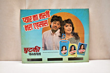 Insegna Pubblicitaria Vintage In Latta Rappresentante Una Coppia Di Beaut