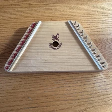 The Music Maker Nepenenoyka Lap Harp Instrument Comes With Sheet Music