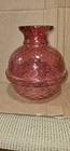 Fenton Cranberry glass vase featuring a "dot optic"