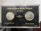 1888 Morgan Silver Dollar 1988 Silver Eagle Silver Dollar. Uncirculated.