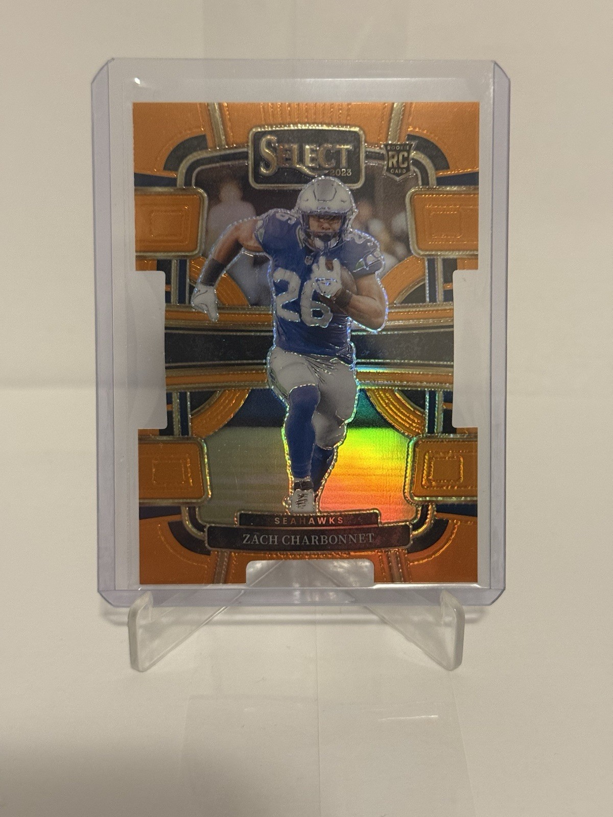2023 Panini Select - Concourse Zach Charbonnet #86 Orange Prizm Die-Cut /499