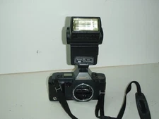 Canon T70 35 mm film Camera Body & Vivitar auto thyristor #273 both working