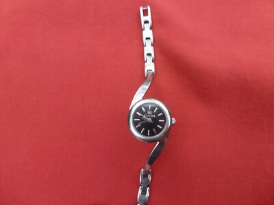 Montre Groove Timepieces Quartz en très bon état Watch Testée vendu