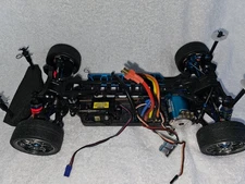 Yokomo mr4tc 1/10 with graphite chassis, servo, and brushless esc/motor 