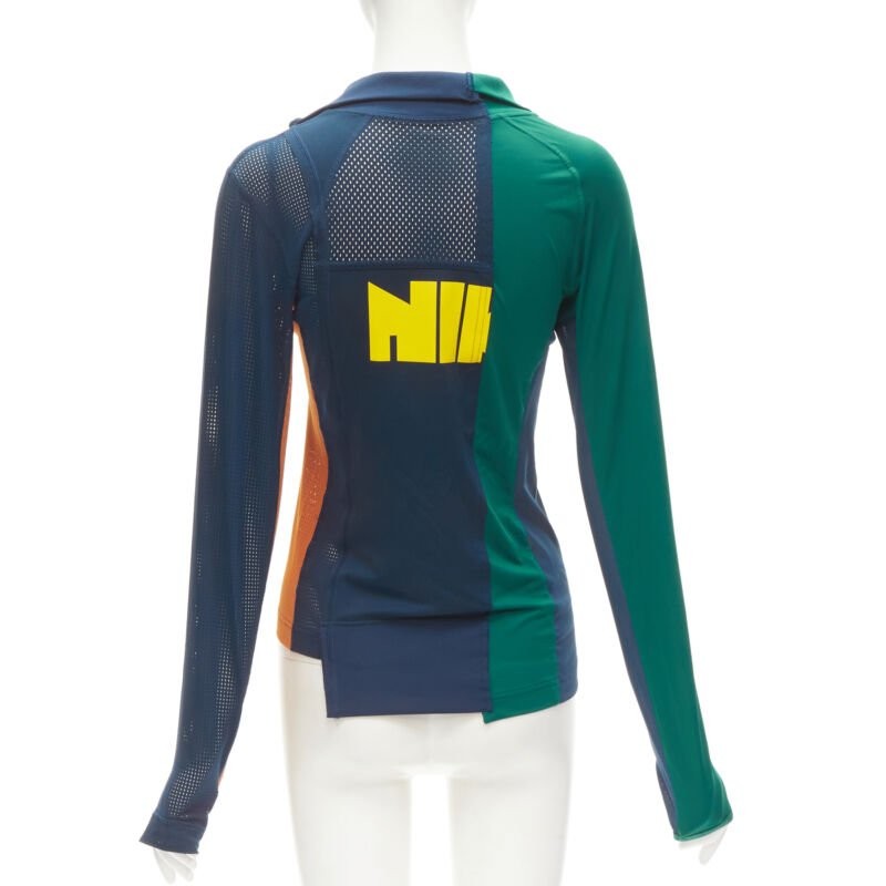 sacai トップス SACAI NIKE Athletics West patchwork football perforated half zip