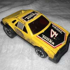 Tonka #4 Yellow Race Car Push Button Vintage Retro