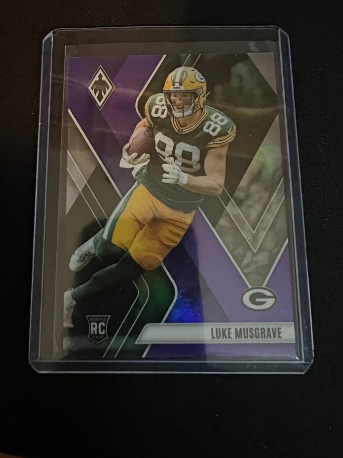 2023 Panini Phoenix - Rookies Purple Seismic #160 Luke Musgrave /125 (RC)
